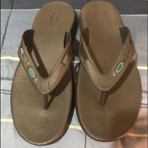 Oakley flip flops.